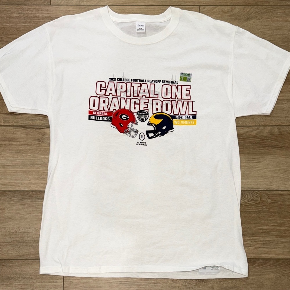 Hanes White Capital One Orange Bowl T-Shirt
Michigan Vs Georgia size large NCAA